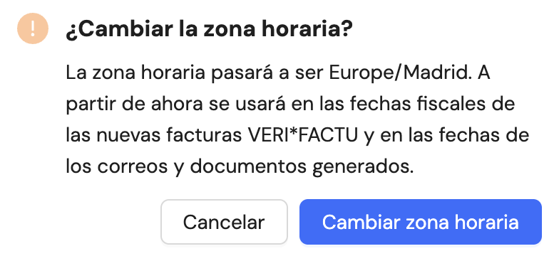 Ventana ¿Cambiar la zona horaria? para Europe/Madrid con los botones Cancelar y Cambiar zona horaria